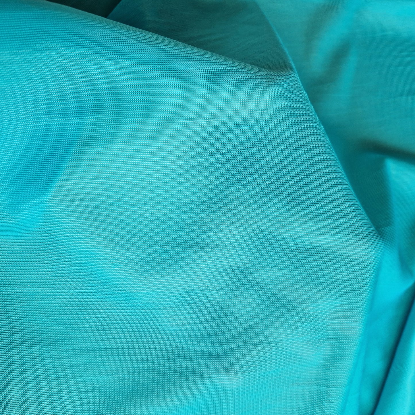 azuur blauw, non stretch, semi transparante marquisette voering