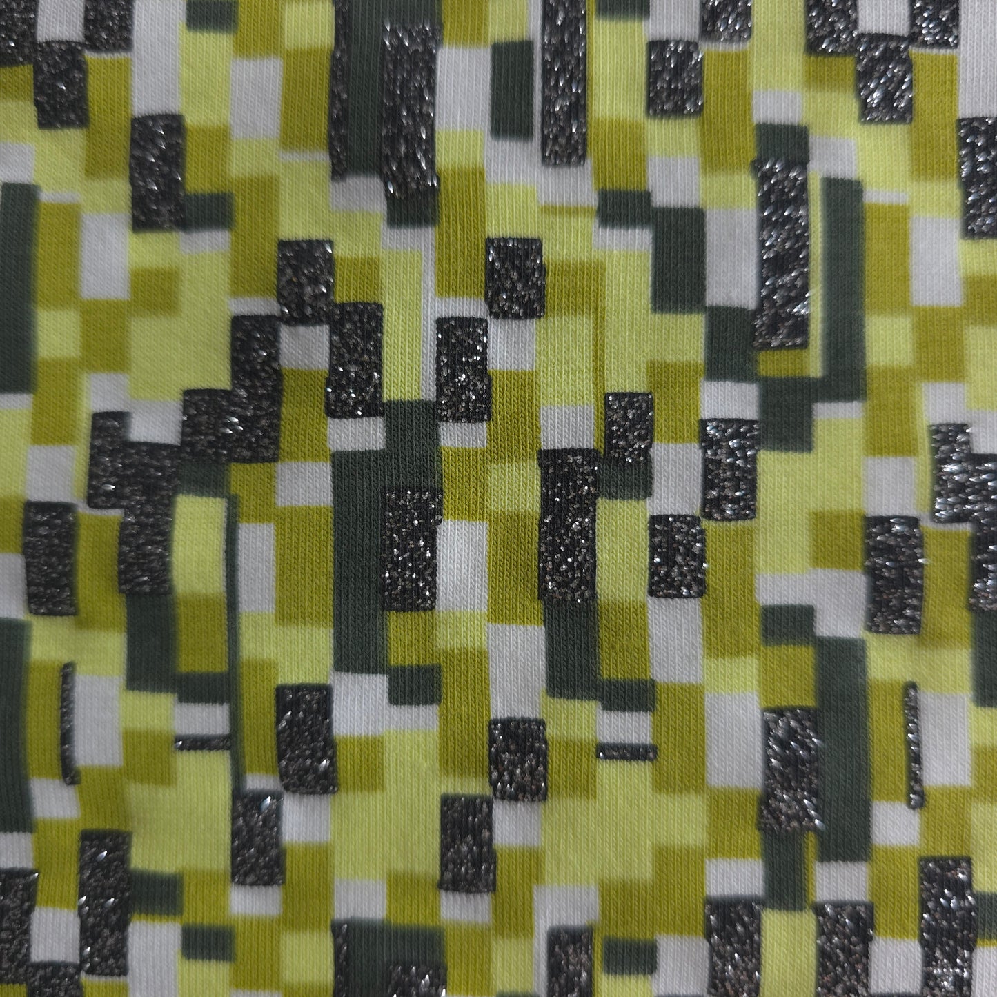 katoen tricot/jersey met geometrisch design in groentinten, voorzien van zilverkleurig glittertje