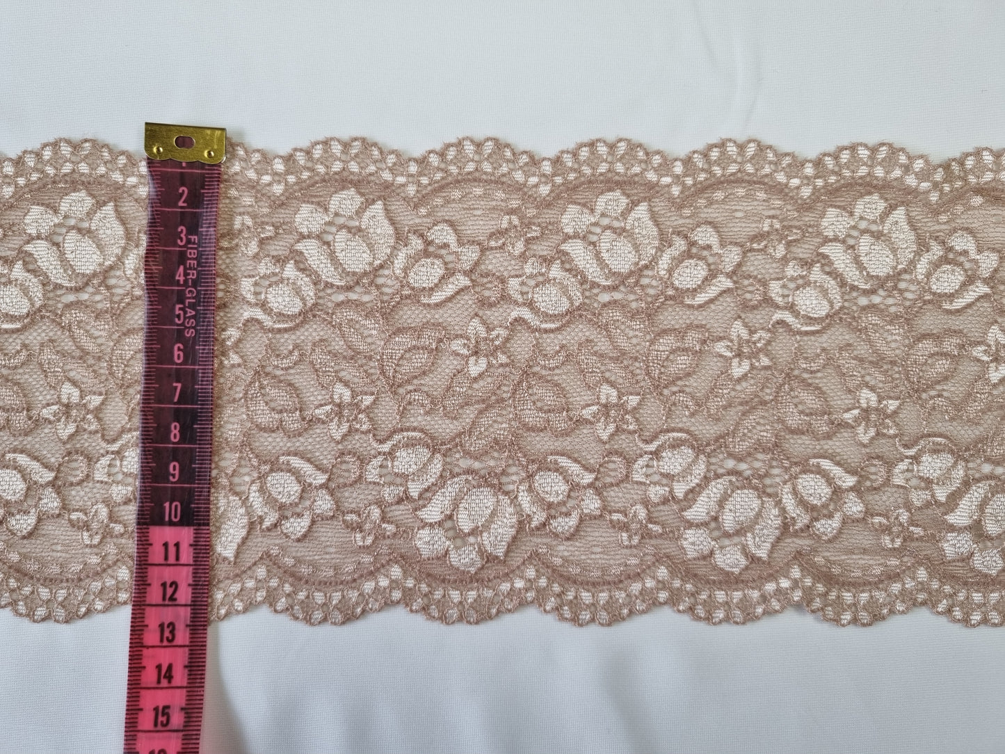 Gebreid stretch kant latte