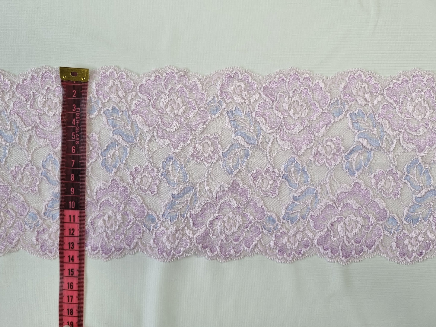 Gebreid stretch kant in pasteltinten