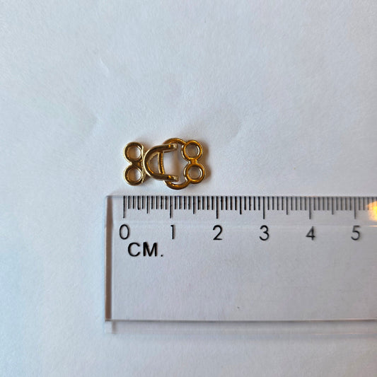 los haakje en oogje champagne goud