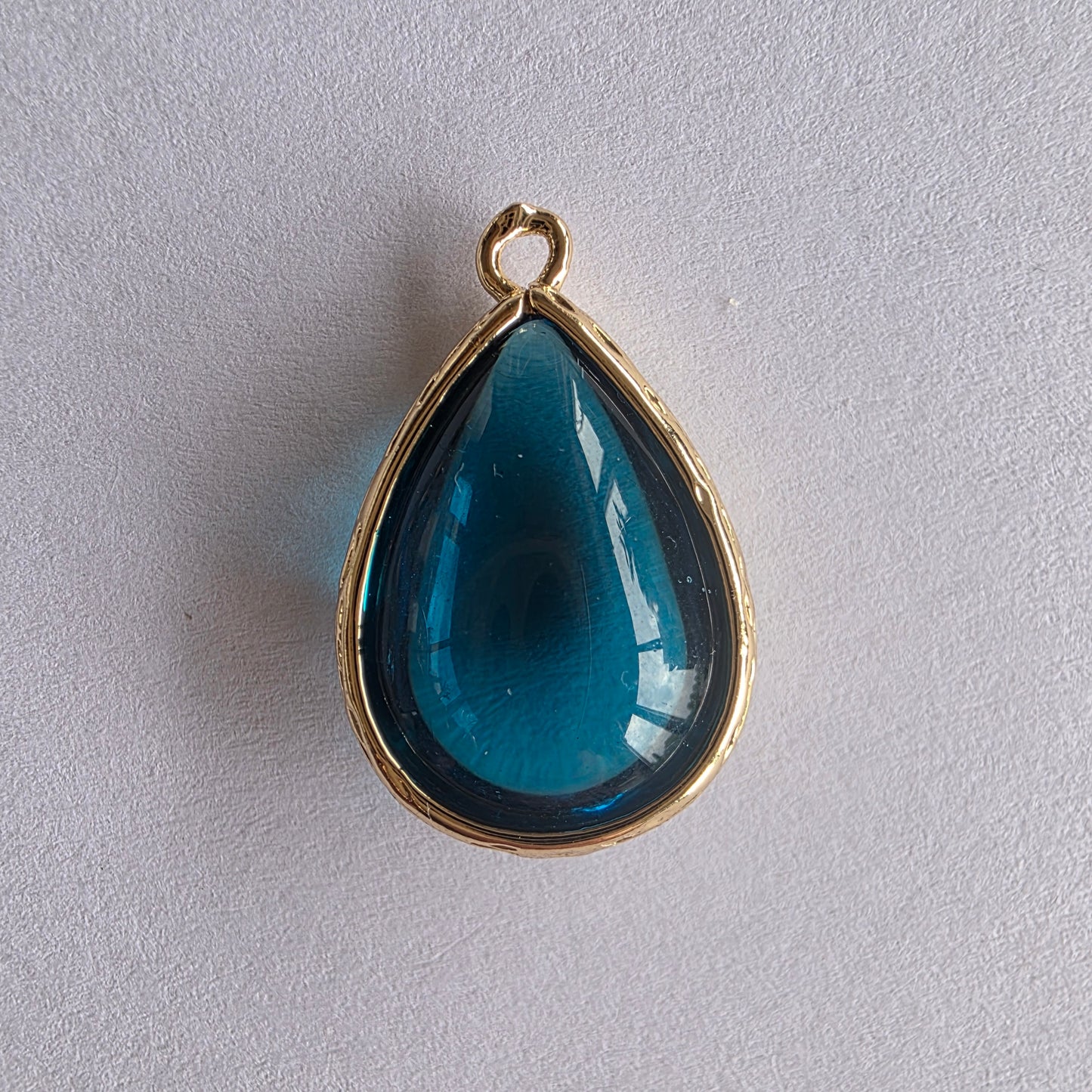 druppel vormige bedel in teal