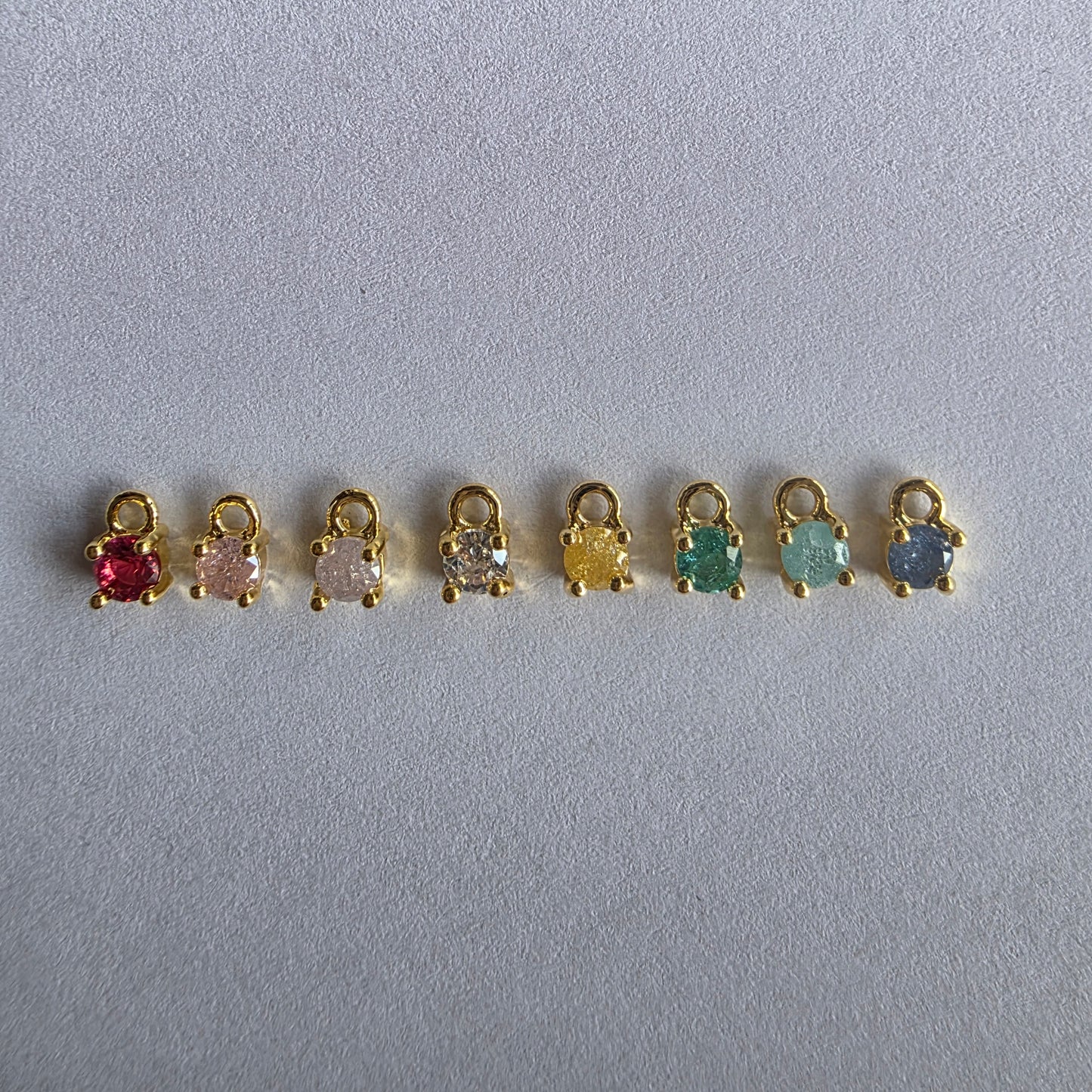 met 18K goud vergulde mini bedeltjes met zirconia in verschillende kleuren